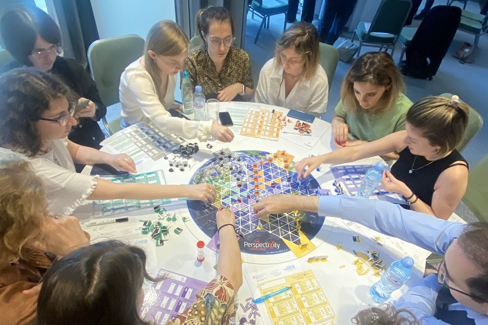 Workshop participants while playing Climate Challenge. Photo: UN Women