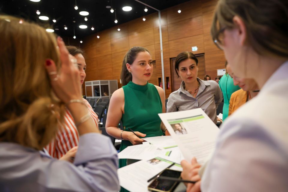 Training of the private sector representatives on unconscious gender bias. Participants engaged in group work. Photo: UN Women/Leli Blagonravova